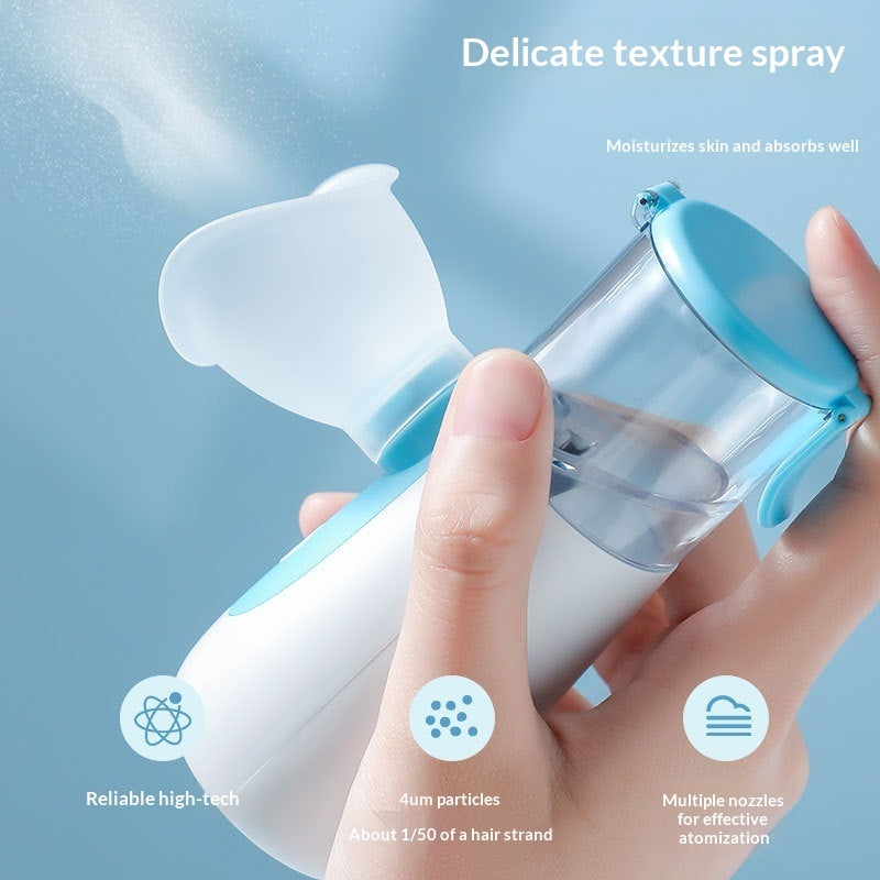 Compact Recore nano-spray handheld device emitting moisturizing water mist