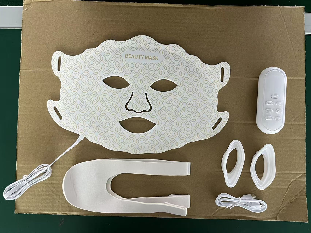 Woman wearing Recore red light facial device for home skin rejuvenation in Nigeria
